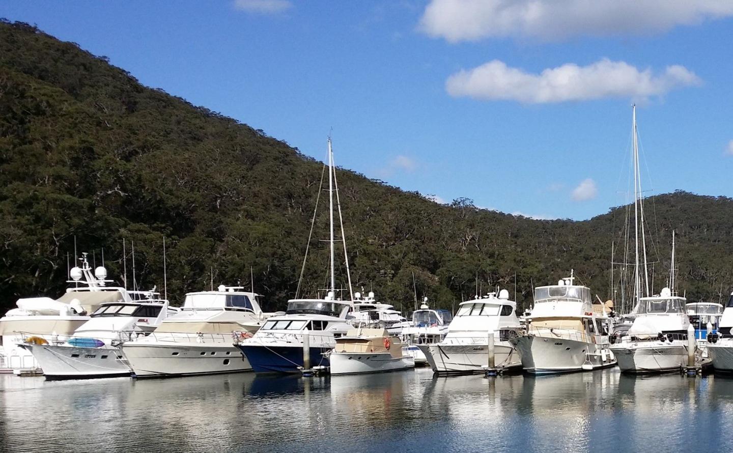 Sailboats between the mountains